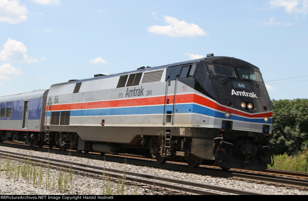 AMUK 66 leads train 74 northbound